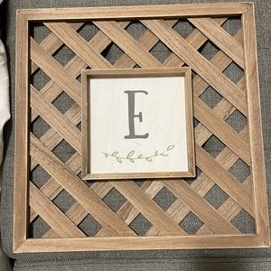 “E” initial wall decor